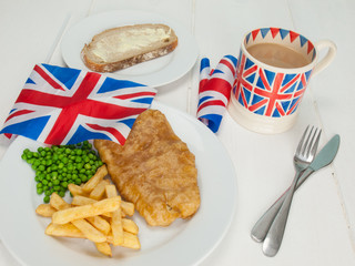 fish and chips with a cup of tea and bread and butter