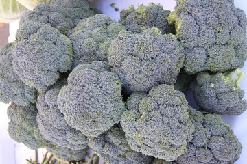 fresh organic broccoli crowns