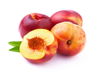 Fototapeta na wymiar Ripe peach with leaf.