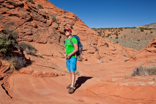 USA - man in coyote buttes recreational park - The wave