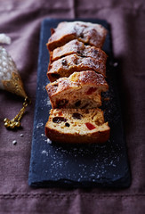 Sliced Christmas Fruit Cake on a Slate