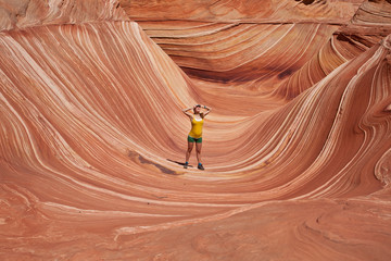 USA - girl in the Coyote buttes recreational park - The wave