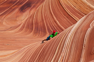 USA - man in coyote buttes recreational park - The wave