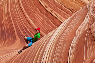 USA - man in coyote buttes recreational park - The wave