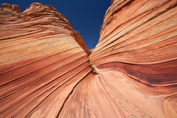 USA - girl in the Coyote buttes recreational park - The wave