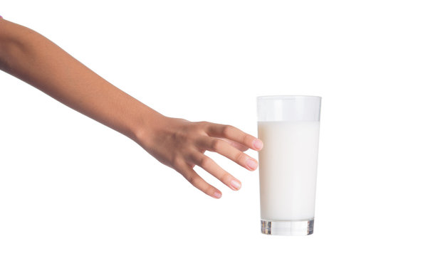 Young Girl Hand With A Glass Of Milk