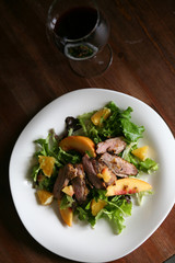 Salad with roasted duck breast and orange