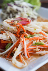 Green papaya salad on the table