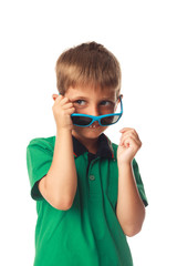 Little smiling boy with sunglasses isolated on white