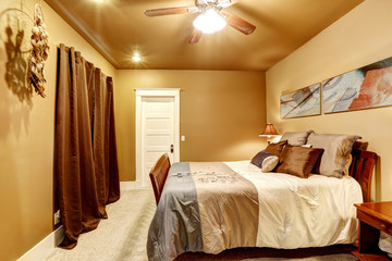 Warm tones bedroom with beautiful bed