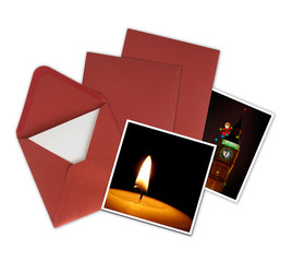 Christmas cards and red envelopes, white background.