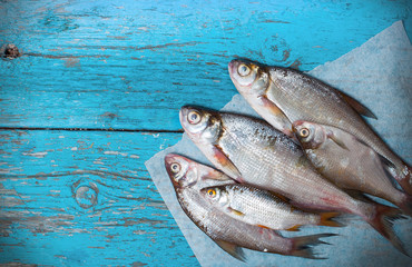 fresh fish a wooden background
