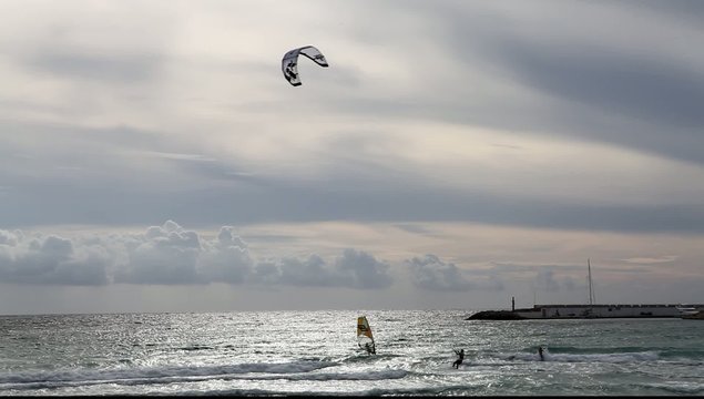seaside ocean clouds waves and a kitesurfer