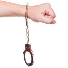male hand in police handcuffs showing gesture isolated