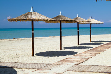 Umbrellas on perfect tropical beach