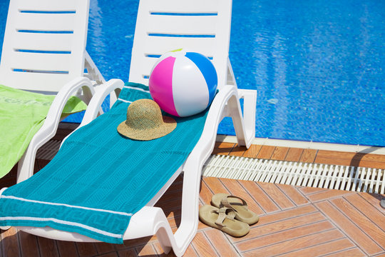 rest in paradise -  swimming pool and ball