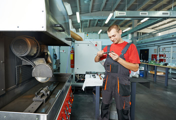 industrial worker at tool workshop