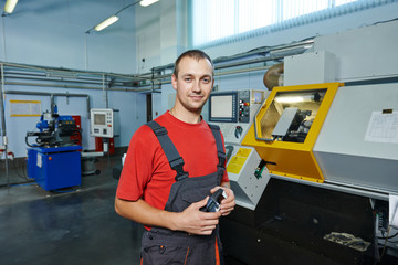 industrial worker at tool workshop