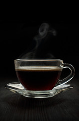 Black hot coffee in a glass cup