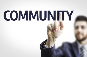Business man pointing the text: Community