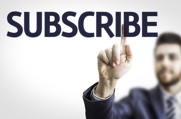 Business man pointing the text: Subscribe