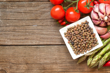 Raw organic roveja beans and vegetables