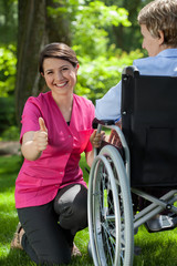 Nurse showing thumbs up sign