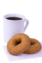 Coffee cup and donuts