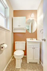 White and orange small bathroom