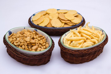 snacks on ceramic and rattan fancy platter