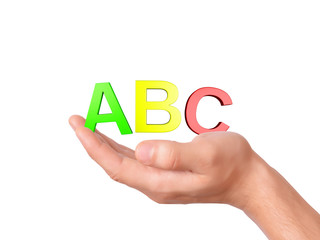 hand holding letters ABC symbol on white Background