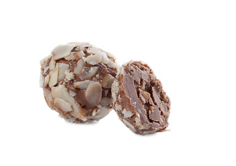 Candy made of milk chocolate with peanut crumbs