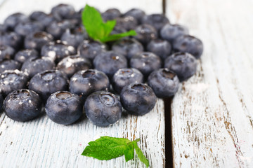 Blueberries on wooden background closeup