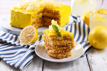 Tasty lemon dessert on wooden table