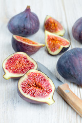 figs on wooden surface