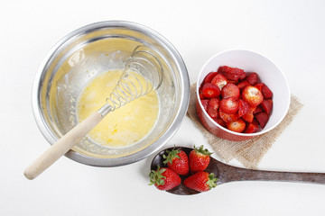 Steps of making strawberry cake isolated