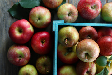 Juicy apples in box, close-up