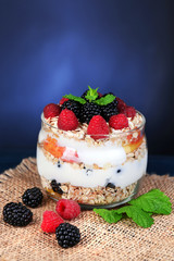 Healthy breakfast - yogurt with  fresh fruit, berries and