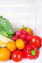 Vegetables in white wooden box
