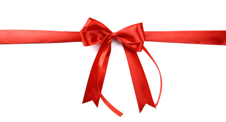 Shiny red ribbon with bow isolated on white