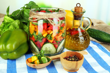 Vegetable salad in glass jar