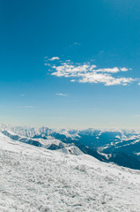 Fototapeta na wymiar Snow mountains on bright winter day
