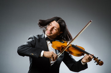 Man violin player in musican concept