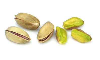 Pistachio nuts ( Real Turkish Antep nuts ) isolated on white