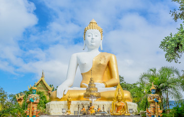 Fototapeta premium Gold buddha statue in thai temple, Thailand