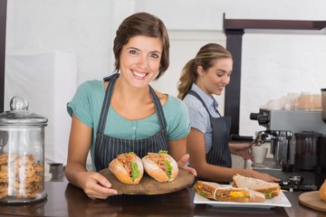 Pretty waitresses working with a smile