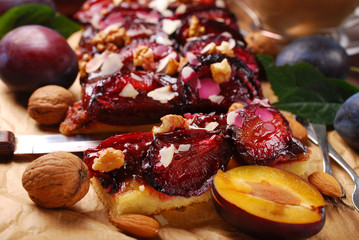 plum cake with almonds and walnuts