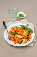 pasta with eggplant mozzarella in a tomato sauce with basil