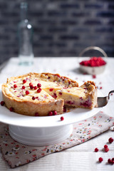 White chocolate cheesecake tart with cranberries