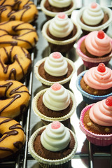 Sweet donuts arranged at display